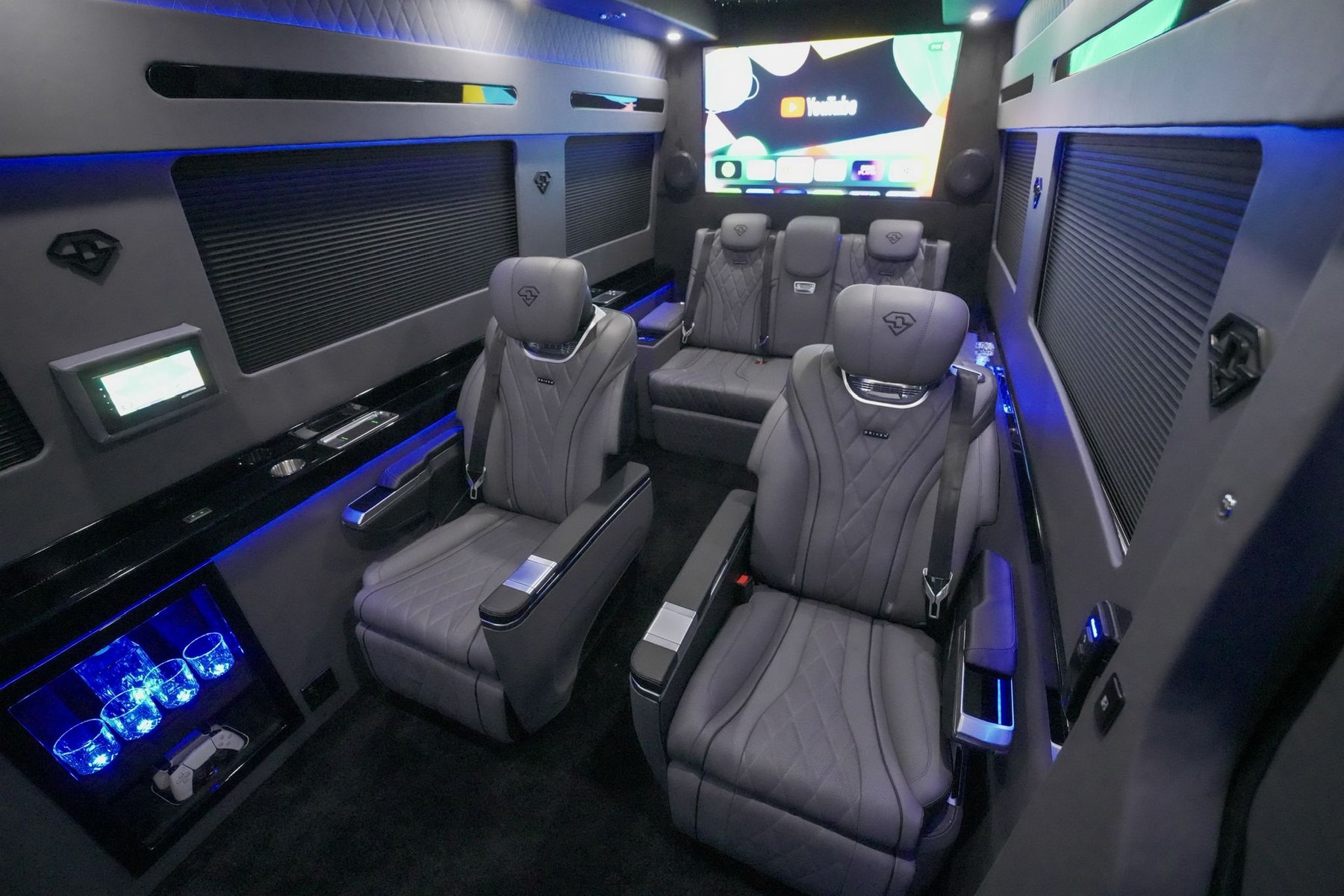 Sprinter cabin interior with illuminated bar and centre console